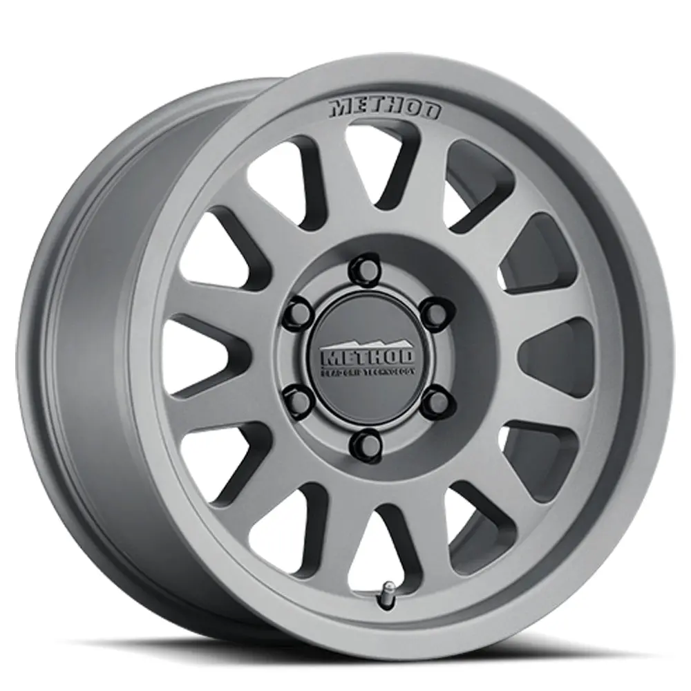 Method 17X9 Bead Grip Mr703 Bolt Pattern 5 On 139.7 Offset -12 Lip Size 1.18 Gloss Titanium Sl Aluminum Wheel 1